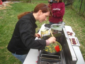 Chef Lisa cooking mugwort frittata